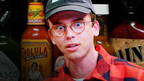 Hot Ones Season 4 Episode 21 - Logic Solves a Rubik's Cube While Eating Spicy Wings